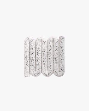 Curved, terrazzo-style Bandy soap dish and coaster in speckled white, designed for elegance and functionality in the home