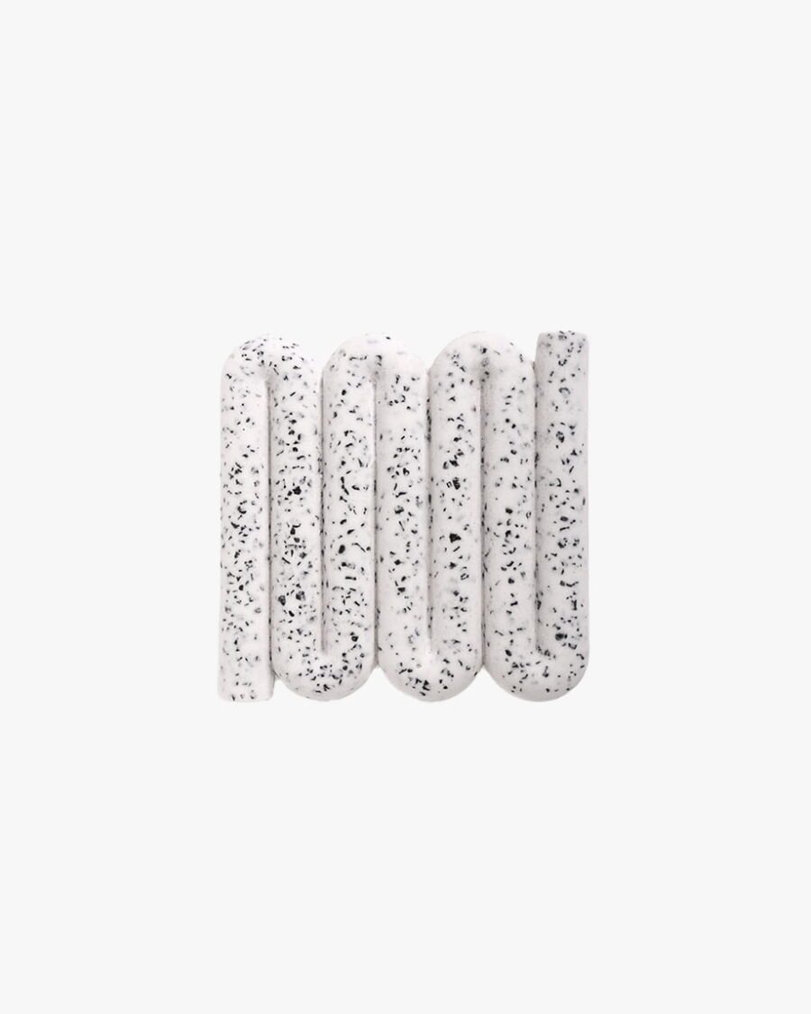 Curved, terrazzo-style Bandy soap dish and coaster in speckled white, designed for elegance and functionality in the home