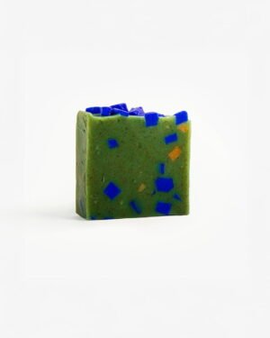 Handcrafted 'Matcha Mint' organic soap with real Matcha tea pieces, in refreshing shades of green with blue accents.