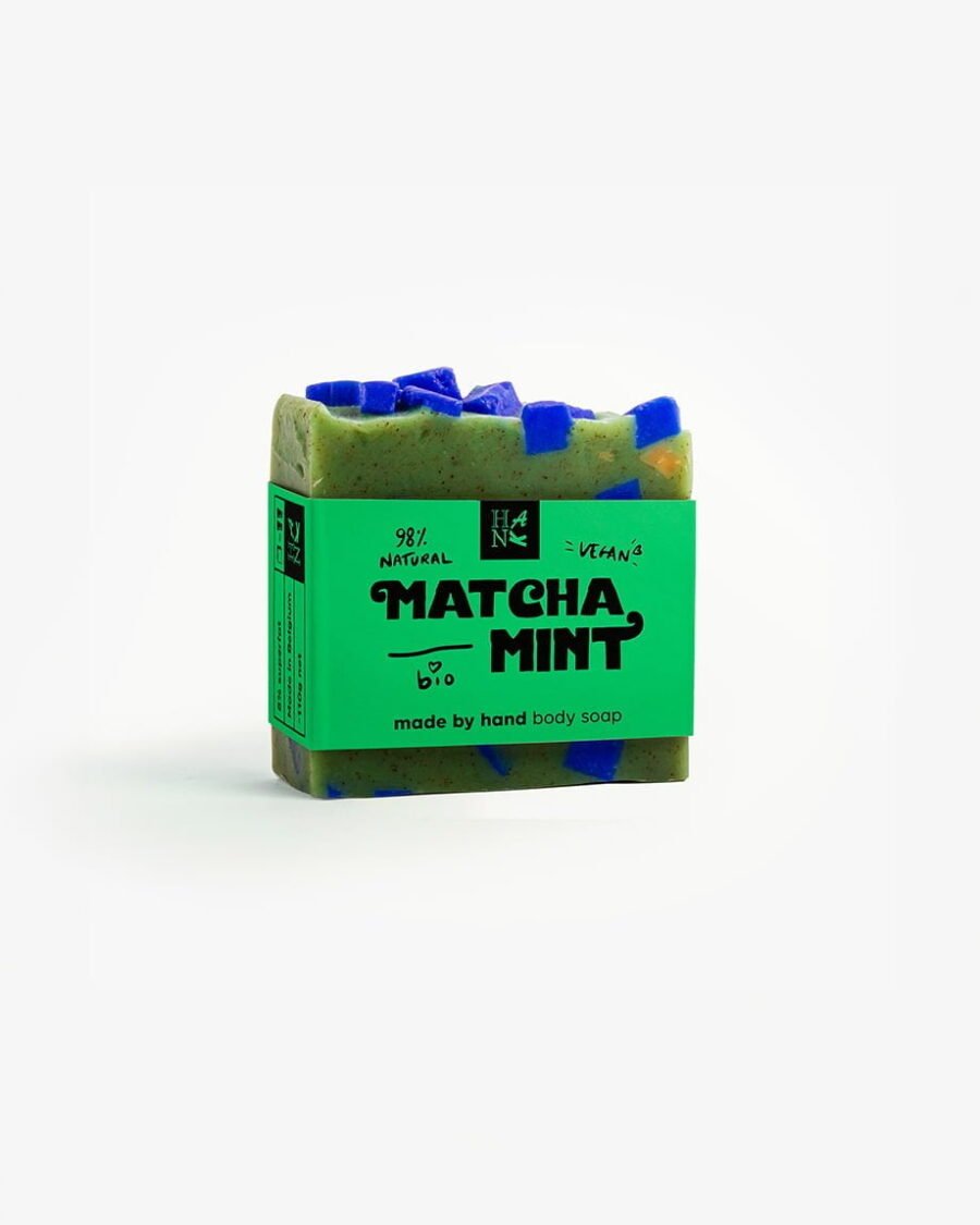 Handcrafted 'Matcha Mint' organic soap with real Matcha tea pieces, in refreshing shades of green with blue accents.