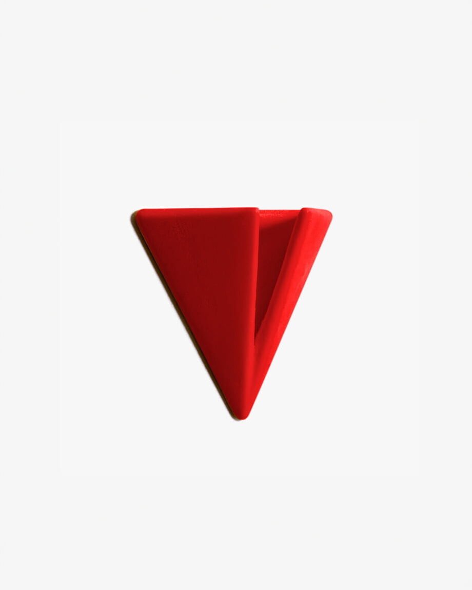 Bright Red PAPERHANK wall hook inspired by the aerodynamic design of paper planes, offering a modern solution for hanging items.