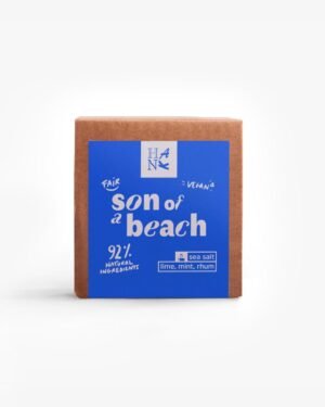 SON OF A BEACH candle in a vibrant blue Jesmonite pot with a terracotta base, exuding scents of lime, mint, salt, and rum for a beachy vibe.